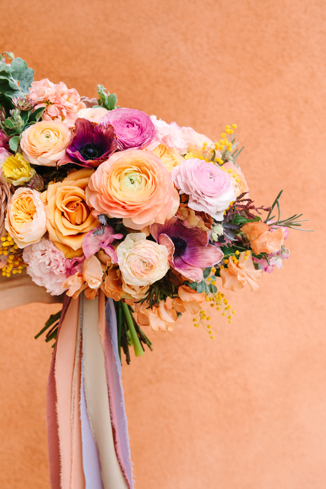 Pastel spring wedding bouquet | Beautiful bridal bouquet inspiration and advice | Colorful and elevated wedding photography for fun-loving couples in Southern California | #weddingflowers #weddingbouquet #bridebouquet #bouquetideas #uniquebouquet   Source: Mary Costa Photography | Los Angeles