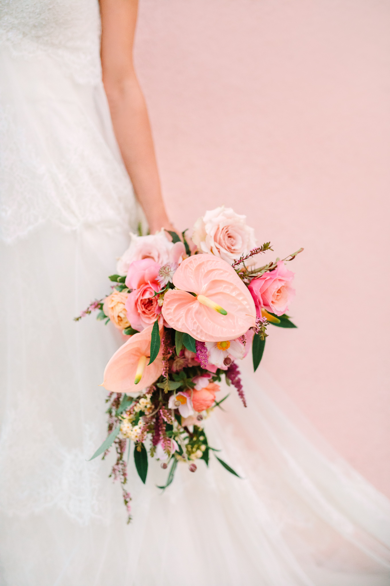 Tropical pink wedding bouquet | Beautiful bridal bouquet inspiration and advice | Colorful and elevated wedding photography for fun-loving couples in Southern California | #weddingflowers #weddingbouquet #bridebouquet #bouquetideas #uniquebouquet   Source: Mary Costa Photography | Los Angeles