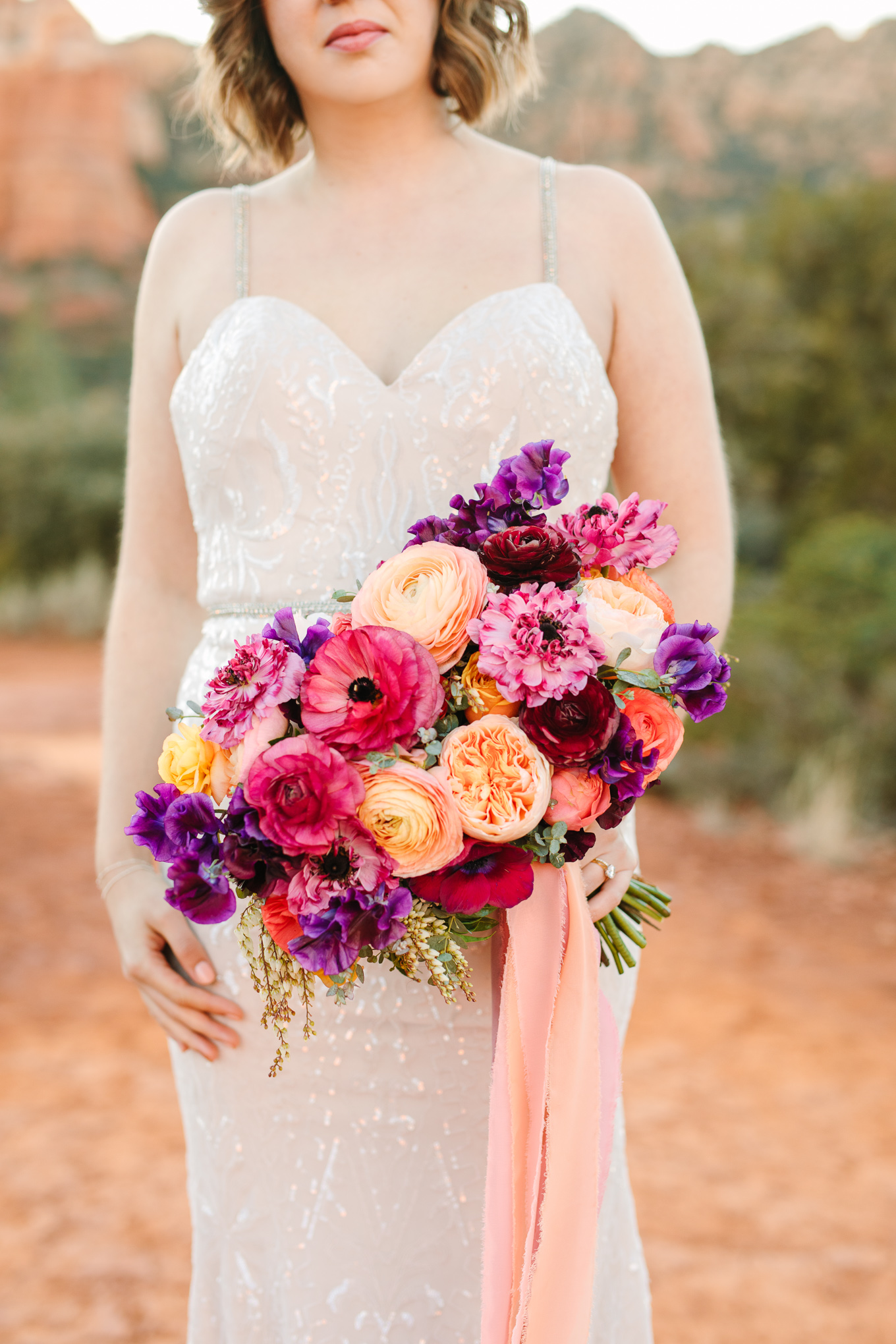 Vibrant sunset-inspired wedding flowers | Beautiful bridal bouquet inspiration and advice | Colorful and elevated wedding photography for fun-loving couples in Southern California | #weddingflowers #weddingbouquet #bridebouquet #bouquetideas #uniquebouquet   Source: Mary Costa Photography | Los Angeles