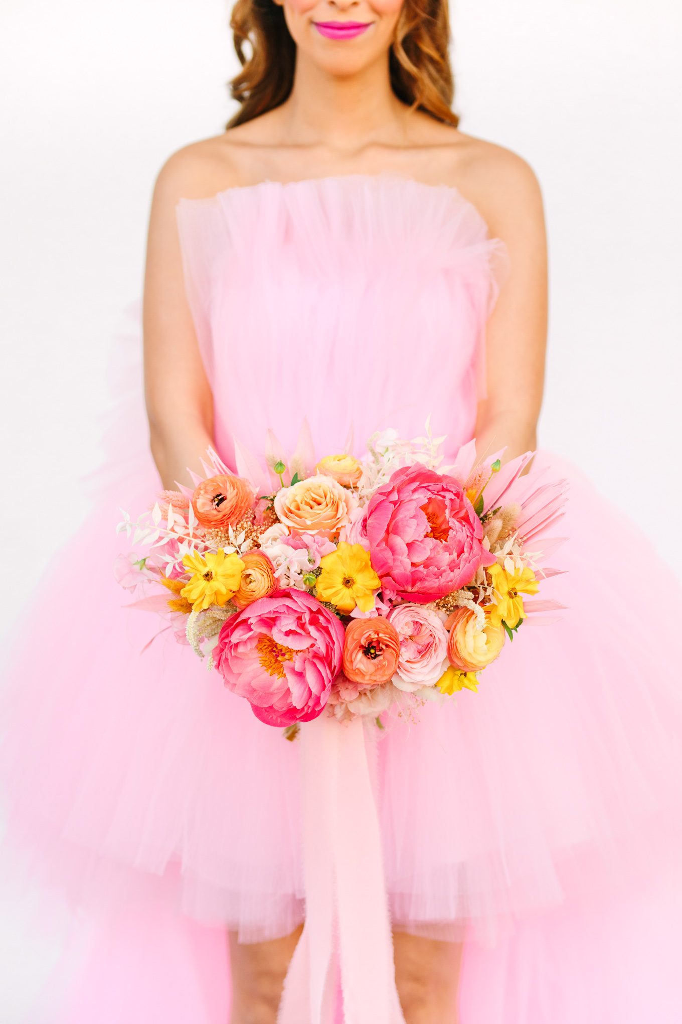Playful pink peony bouquet with pink wedding dress | Beautiful bridal bouquet inspiration and advice | Colorful and elevated wedding photography for fun-loving couples in Southern California | #weddingflowers #weddingbouquet #bridebouquet #bouquetideas #uniquebouquet   Source: Mary Costa Photography | Los Angeles