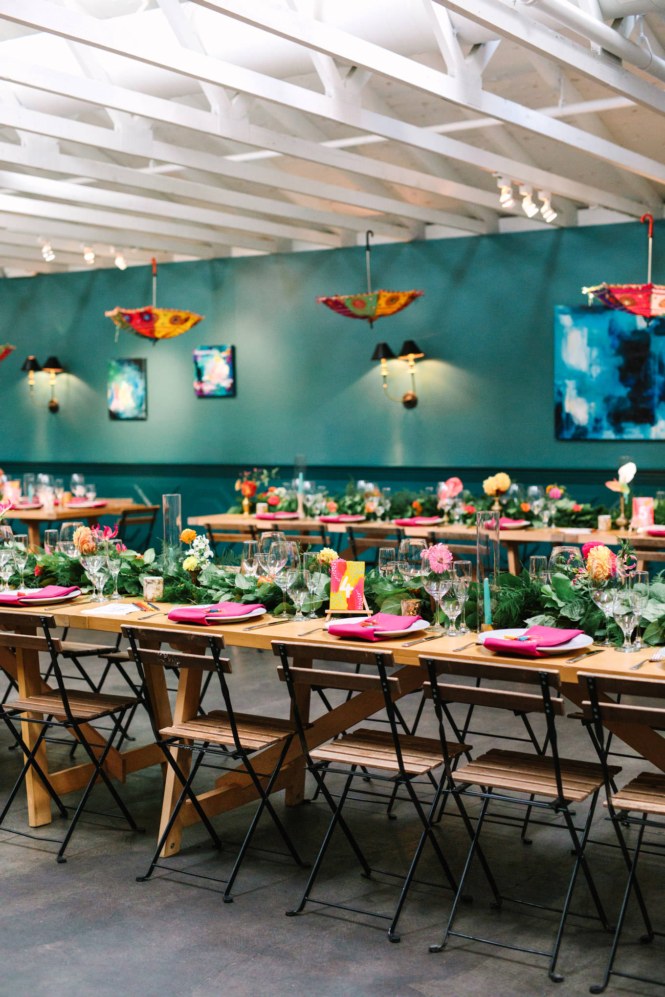 Colorful wedding reception tables. Two Disney artists create a unique and colorful Indian Fusion wedding at The Fig House Los Angeles, featured on Green Wedding Shoes. | Colorful and elevated wedding inspiration for fun-loving couples in Southern California | #indianwedding #indianfusionwedding #thefighouse #losangeleswedding   Source: Mary Costa Photography | Los Angeles