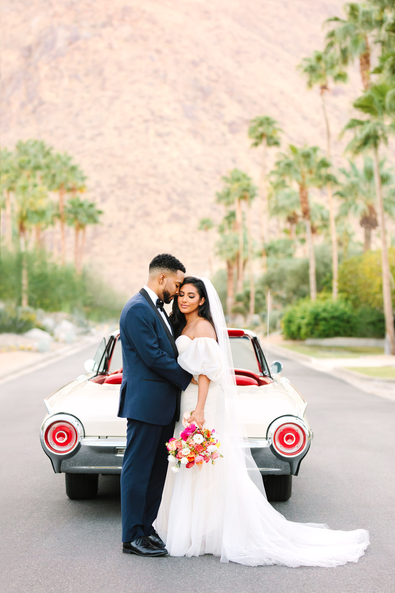 Palm Springs elopement with classic Ford Thunderbird | Engagement, elopement, and wedding photography roundup of Mary Costa’s favorite images from 2020 | Colorful and elevated photography for fun-loving couples in Southern California | #2020wedding #elopement #weddingphoto #weddingphotography   Source: Mary Costa Photography | Los Angeles