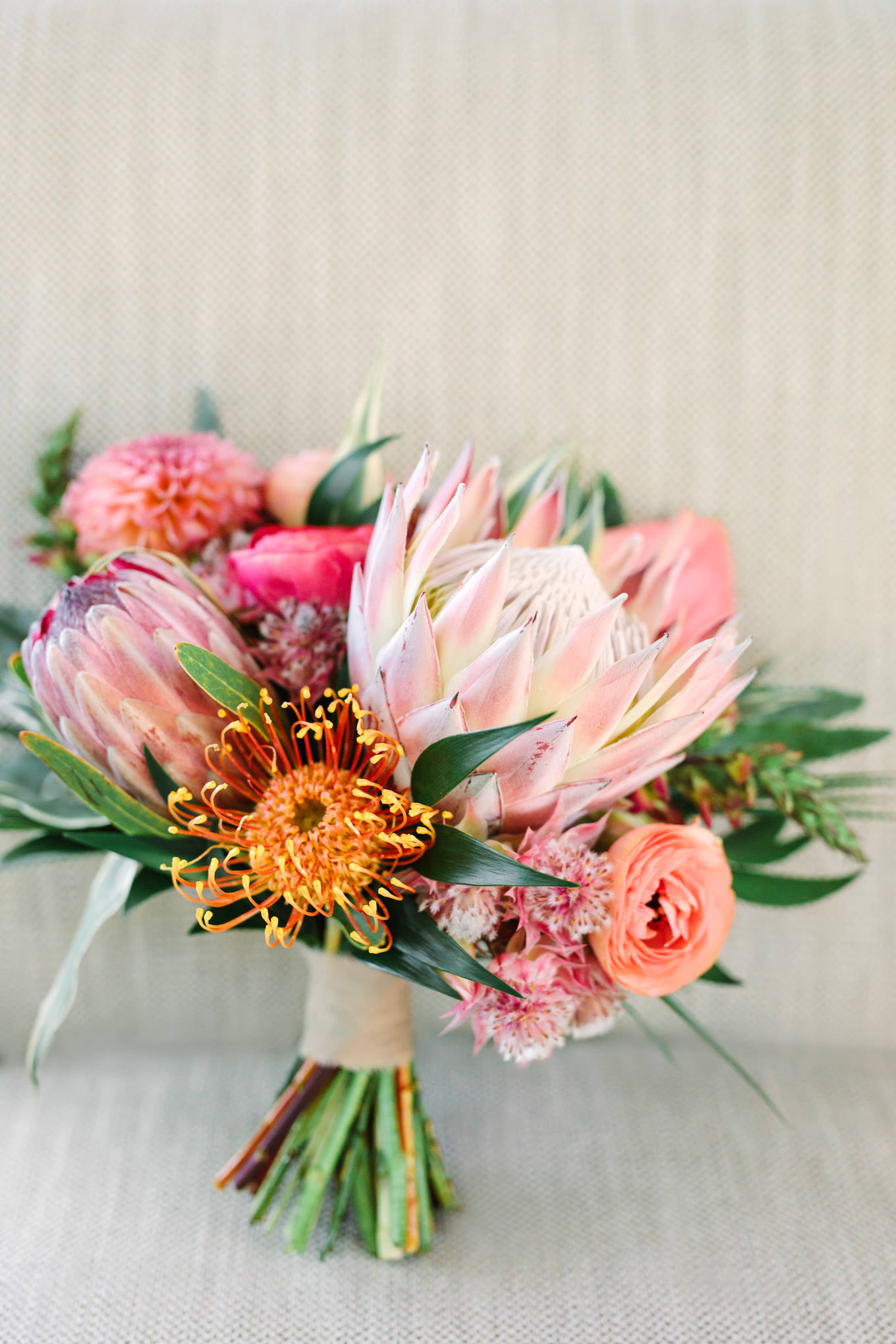 Tropical protea bouquet | Engagement, elopement, and wedding photography roundup of Mary Costa’s favorite images from 2020 | Colorful and elevated photography for fun-loving couples in Southern California | #2020wedding #elopement #weddingphoto #weddingphotography   Source: Mary Costa Photography | Los Angeles
