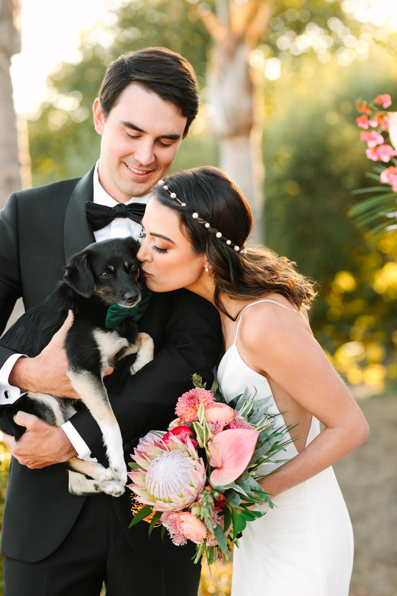 Bride kissing her dog at Malibu micro wedding | Engagement, elopement, and wedding photography roundup of Mary Costa’s favorite images from 2020 | Colorful and elevated photography for fun-loving couples in Southern California | #2020wedding #elopement #weddingphoto #weddingphotography #microwedding   Source: Mary Costa Photography | Los Angeles