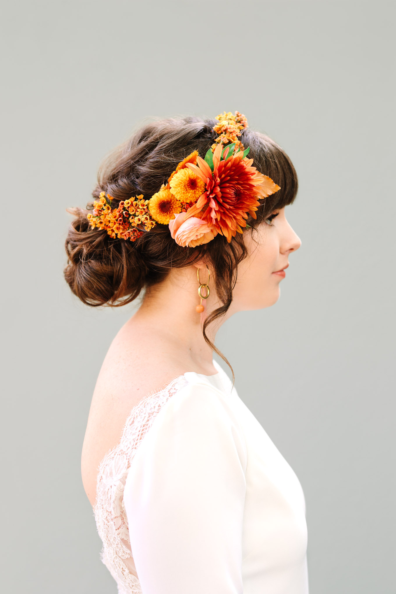 Bridal updo with colorful autumn flower crown | Engagement, elopement, and wedding photography roundup of Mary Costa’s favorite images from 2020 | Colorful and elevated photography for fun-loving couples in Southern California | #2020wedding #bridalupdo #weddinghair #flowercrown #microwedding   Source: Mary Costa Photography | Los Angeles
