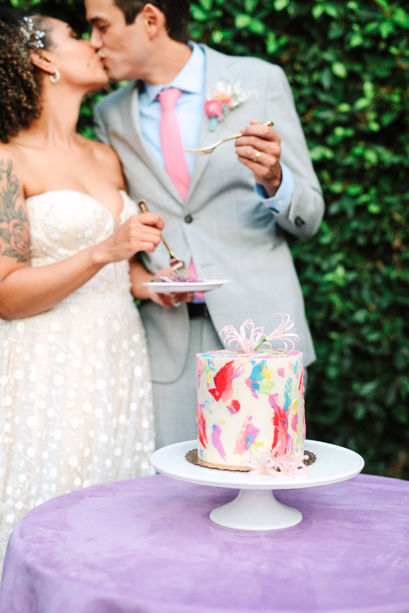 Bride and groom cutting watercolor cake Los Angeles Chinatown engagement session | Engagement, elopement, and wedding photography roundup of Mary Costa’s favorite images from 2020 | Colorful and elevated photography for fun-loving couples in Southern California | #2020wedding #elopement #weddingphoto #weddingphotography #microwedding   Source: Mary Costa Photography | Los Angeles