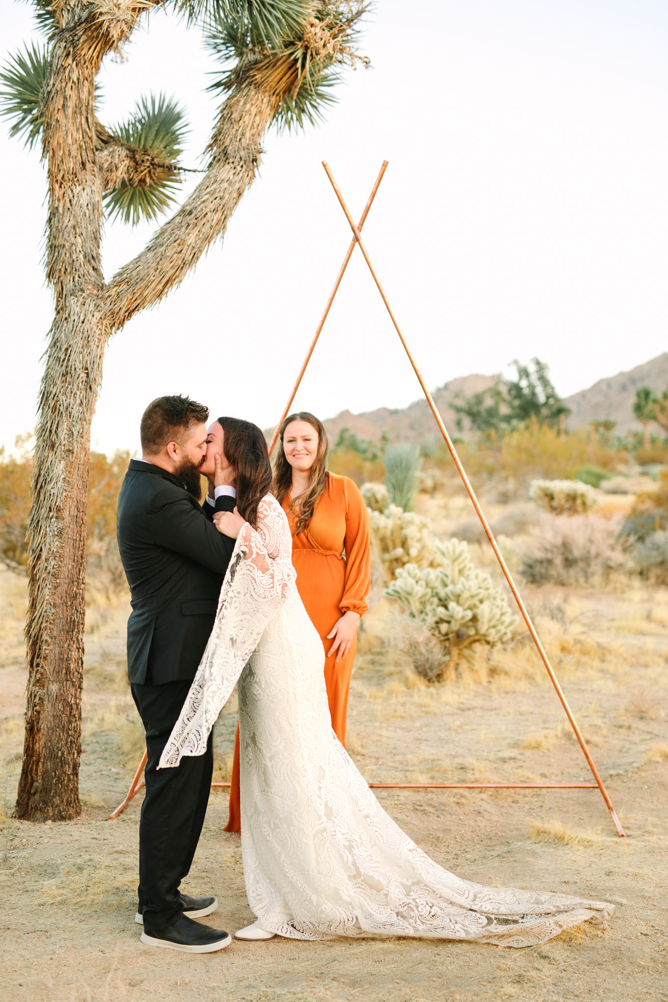 Joshua Tree elopement with triangle arch | Engagement, elopement, and wedding photography roundup of Mary Costa’s favorite images from 2020 | Colorful and elevated photography for fun-loving couples in Southern California | #2020wedding #elopement #weddingphoto #weddingphotography #microwedding   Source: Mary Costa Photography | Los Angeles