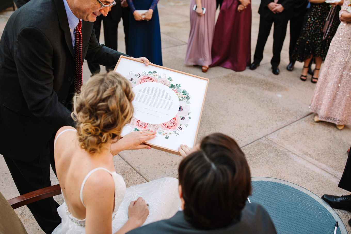 Ketubah signing | Living Desert Zoo & Gardens wedding with unique details | Elevated and colorful wedding photography for fun-loving couples in Southern California |  #PalmSprings #palmspringsphotographer #gardenwedding #palmspringswedding  Source: Mary Costa Photography | Los Angeles wedding photographer 
