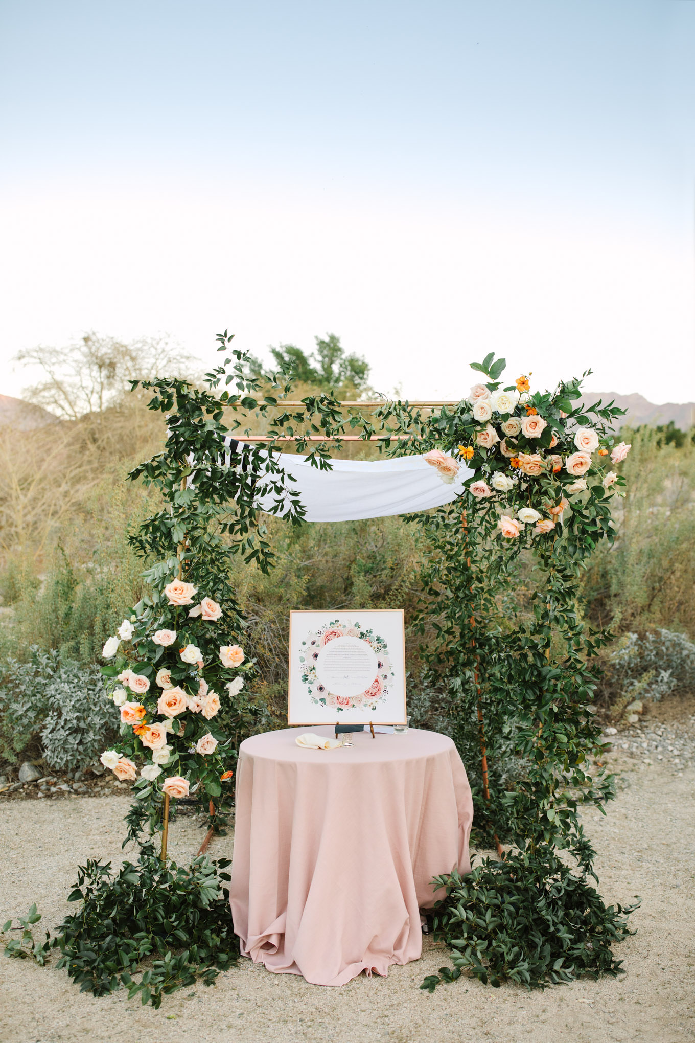 Ketubah and chuppah at wedding ceremony | Living Desert Zoo & Gardens wedding with unique details | Elevated and colorful wedding photography for fun-loving couples in Southern California |  #PalmSprings #palmspringsphotographer #gardenwedding #palmspringswedding  Source: Mary Costa Photography | Los Angeles wedding photographer 