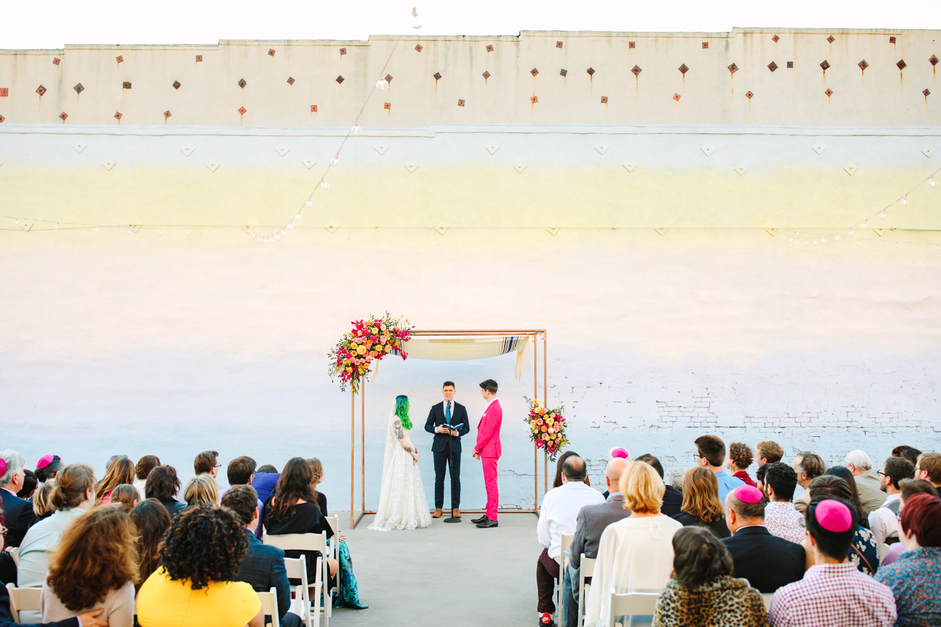 Ombre wall ceremony at | Colorful wedding at The Unique Space Los Angeles published in The Knot Magazine | Fresh and colorful photography for fun-loving couples in Southern California | #colorfulwedding #losangeleswedding #weddingphotography #uniquespace Source: Mary Costa Photography | Los Angeles