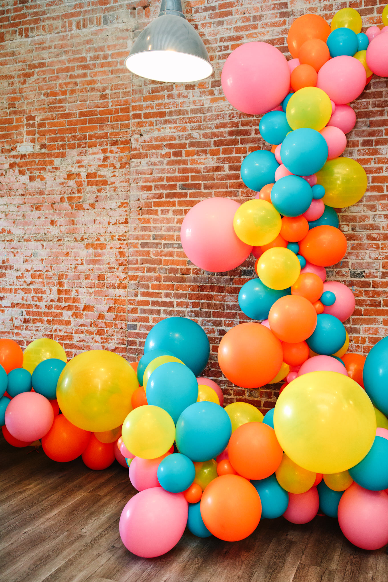 Balloon install at Unique Space | Colorful wedding at The Unique Space Los Angeles published in The Knot Magazine | Fresh and colorful photography for fun-loving couples in Southern California | #colorfulwedding #losangeleswedding #weddingphotography #uniquespace Source: Mary Costa Photography | Los Angeles