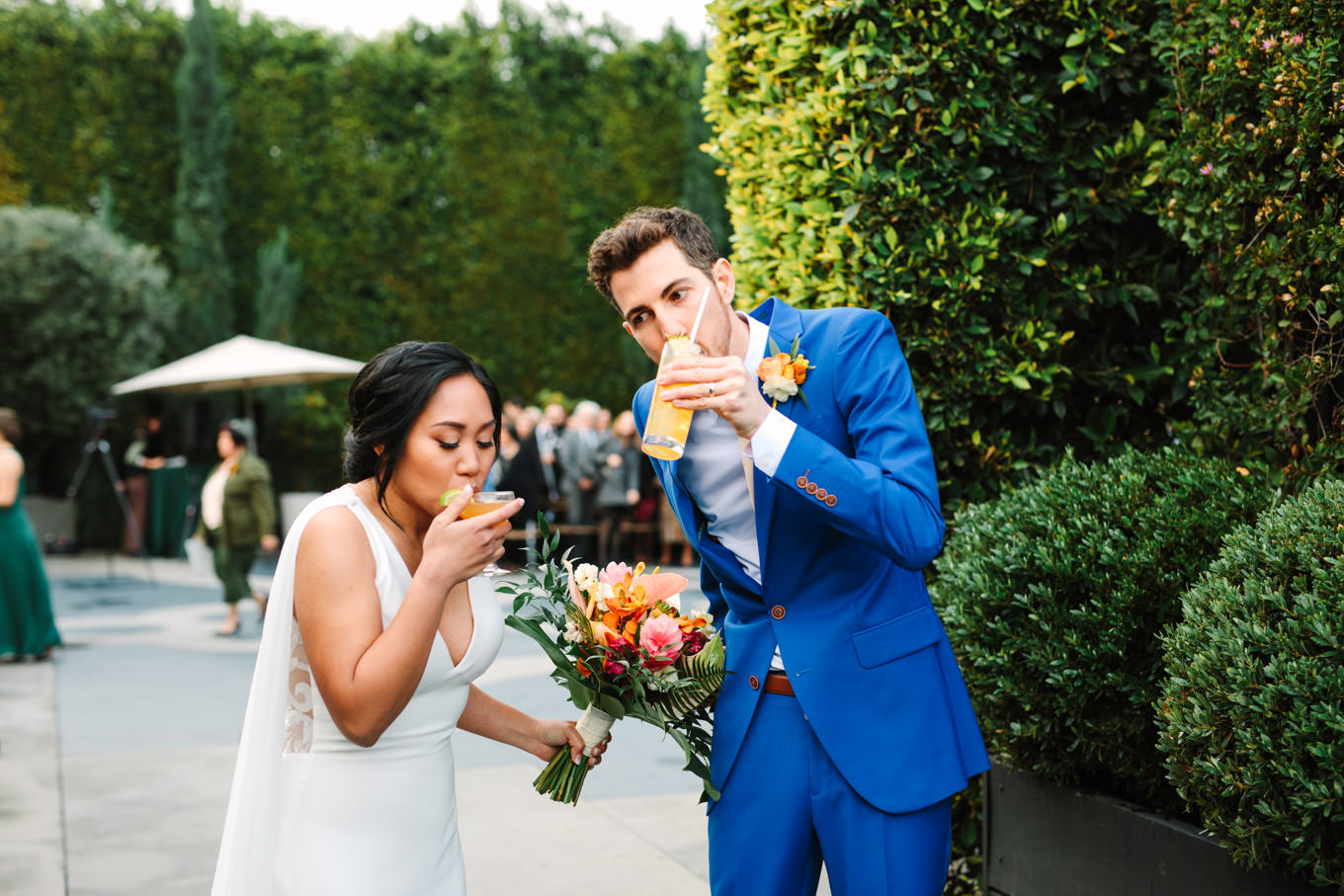 Bride and groom drinking cocktails after wedding ceremony | TV inspired wedding at The Fig House Los Angeles | Published on The Knot | Fresh and colorful photography for fun-loving couples in Southern California | #losangeleswedding #TVwedding #colorfulwedding #theknot   Source: Mary Costa Photography | Los Angeles wedding photographer
