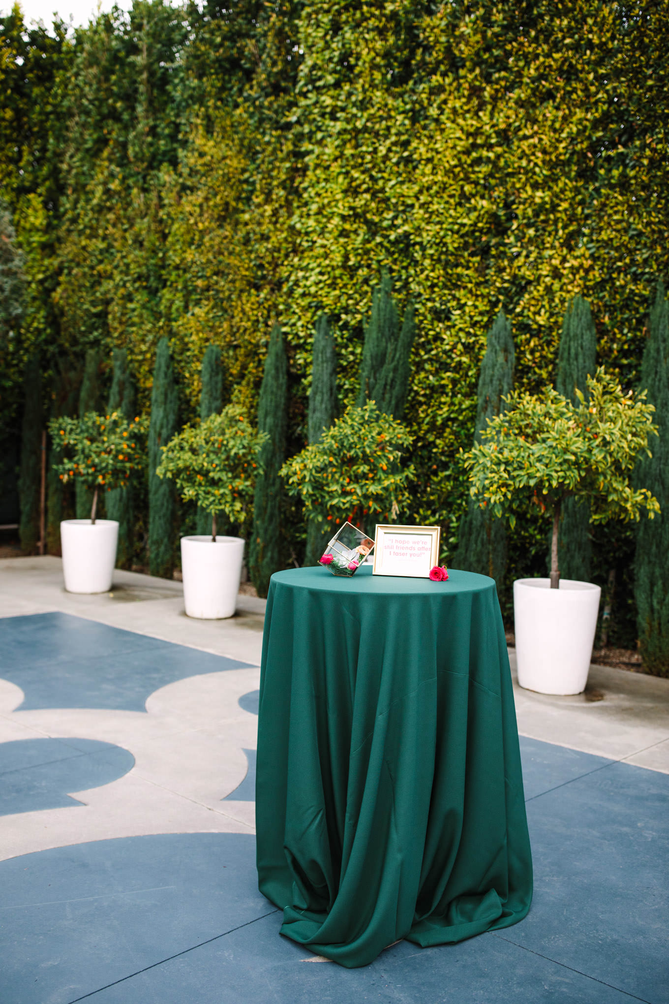 Emerald cocktail bar table | TV inspired wedding at The Fig House Los Angeles | Published on The Knot | Fresh and colorful photography for fun-loving couples in Southern California | #losangeleswedding #TVwedding #colorfulwedding #theknot   Source: Mary Costa Photography | Los Angeles wedding photographer
