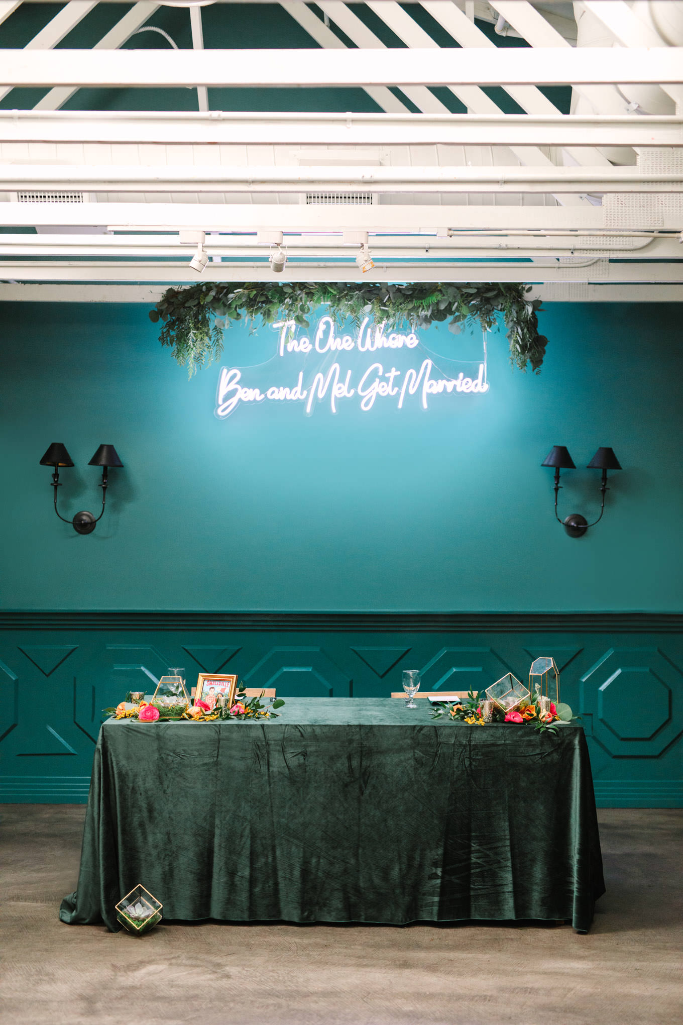 Bride and groom's sweetheart table with neon sign | TV inspired wedding at The Fig House Los Angeles | Published on The Knot | Fresh and colorful photography for fun-loving couples in Southern California | #losangeleswedding #TVwedding #colorfulwedding #theknot   Source: Mary Costa Photography | Los Angeles wedding photographer