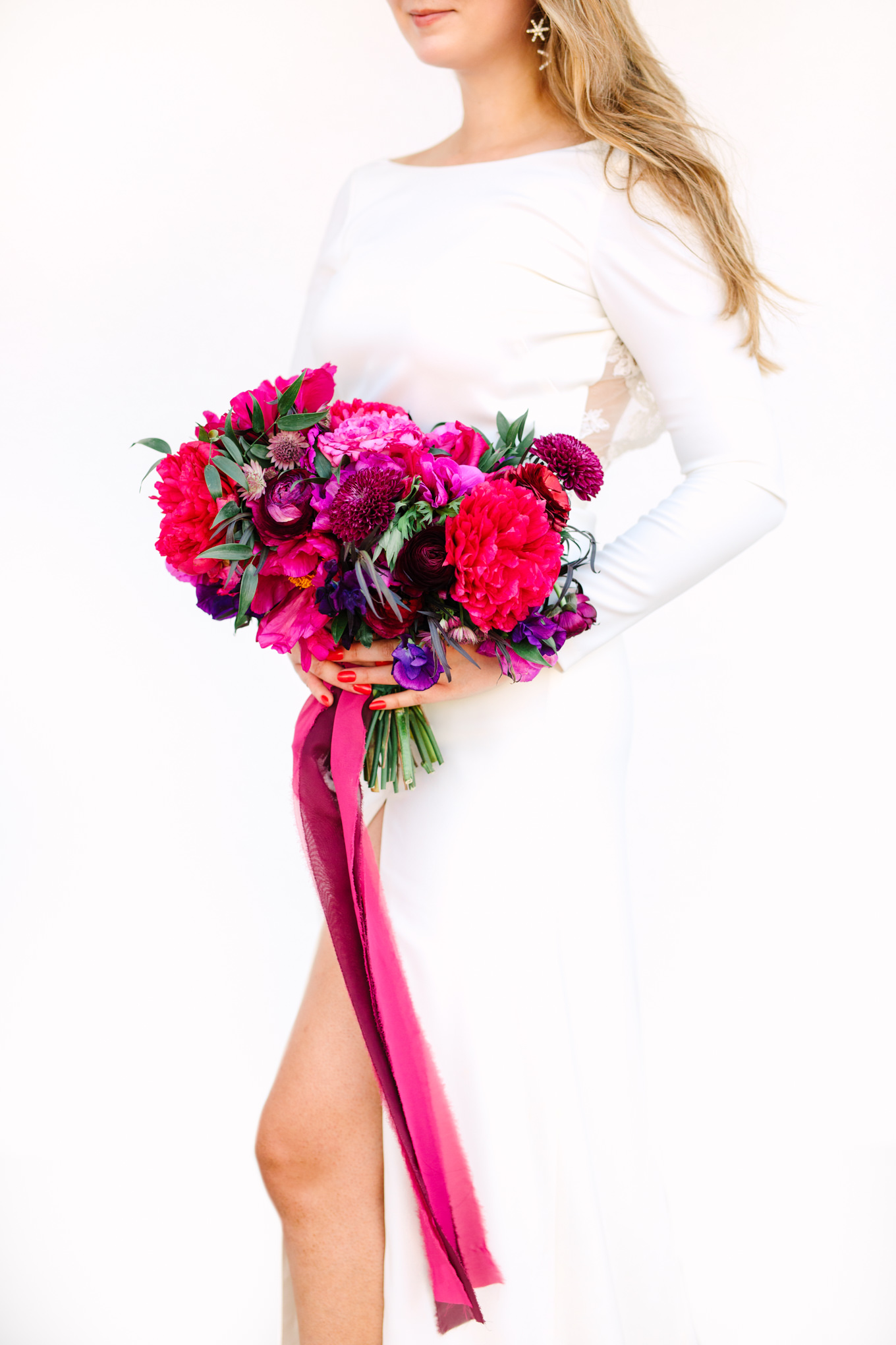 Jewel tone bridal bouquet by Shindig Chic | Colorful jewel tone Palm Springs elopement | Fresh and colorful photography for fun-loving couples in Southern California | #colorfulelopement #palmspringselopement #elopementphotography #palmspringswedding Source: Mary Costa Photography | Los Angeles