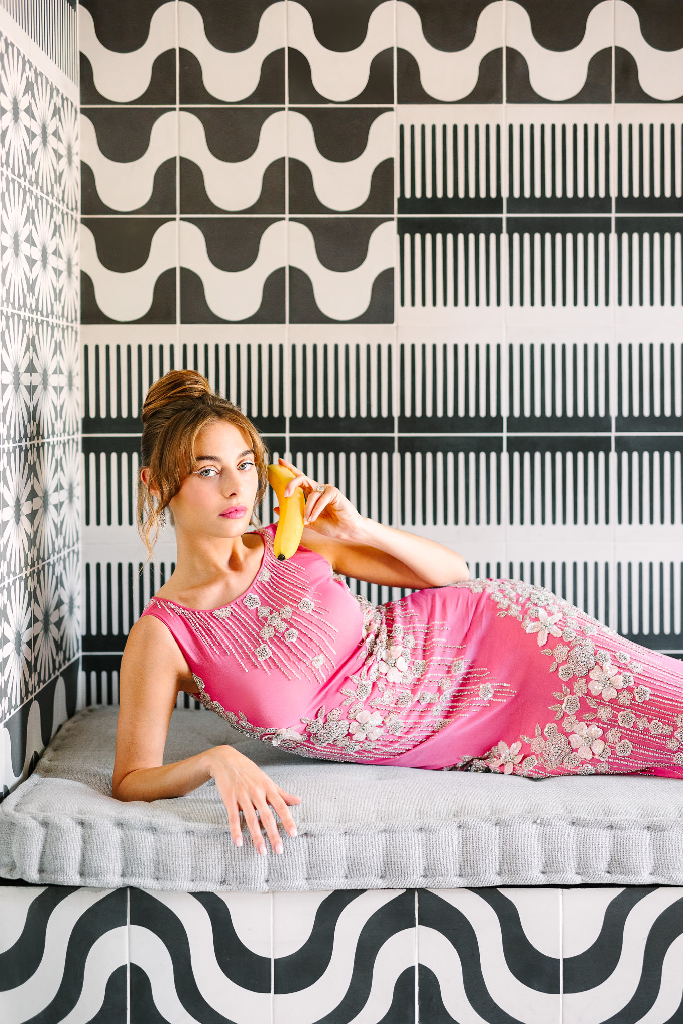 Beaded pink Naeem Khan gown in Sands Hotel tiled lobby with banana phone | Kindred Presets x Mary Costa Photography Sands Hotel Ad Campaign | Colorful Palm Springs wedding photography | #palmspringsphotographer #lightroompresets #sandshotel #pinkhotel   Source: Mary Costa Photography | Los Angeles