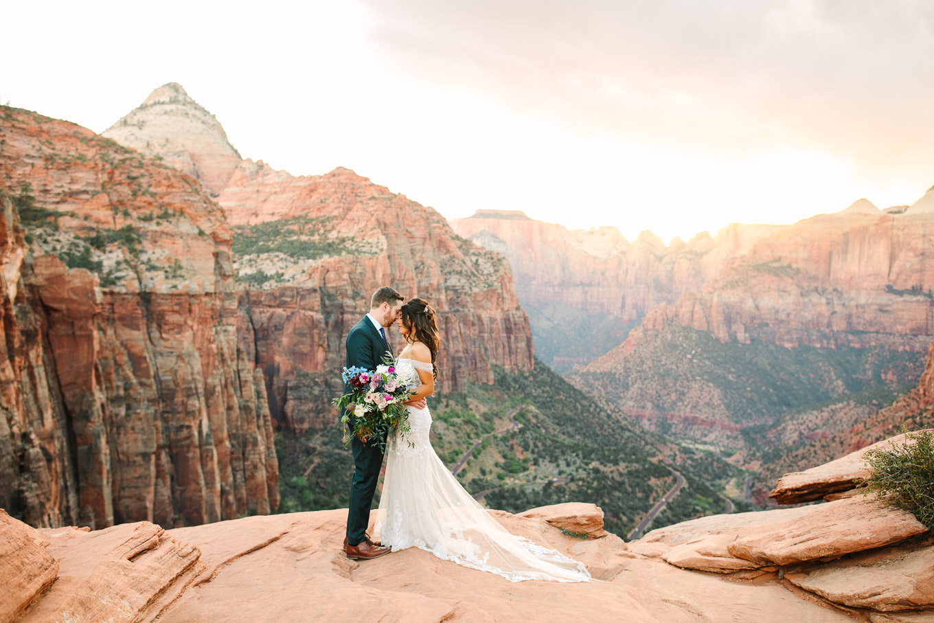 Stunning Canyon overlook | Zion National Park sunset elopement scenic overlook | Colorful adventure elopement photography | #utahelopement #zionelopement #zionwedding #undercanvaszion   Source: Mary Costa Photography | Los Angeles