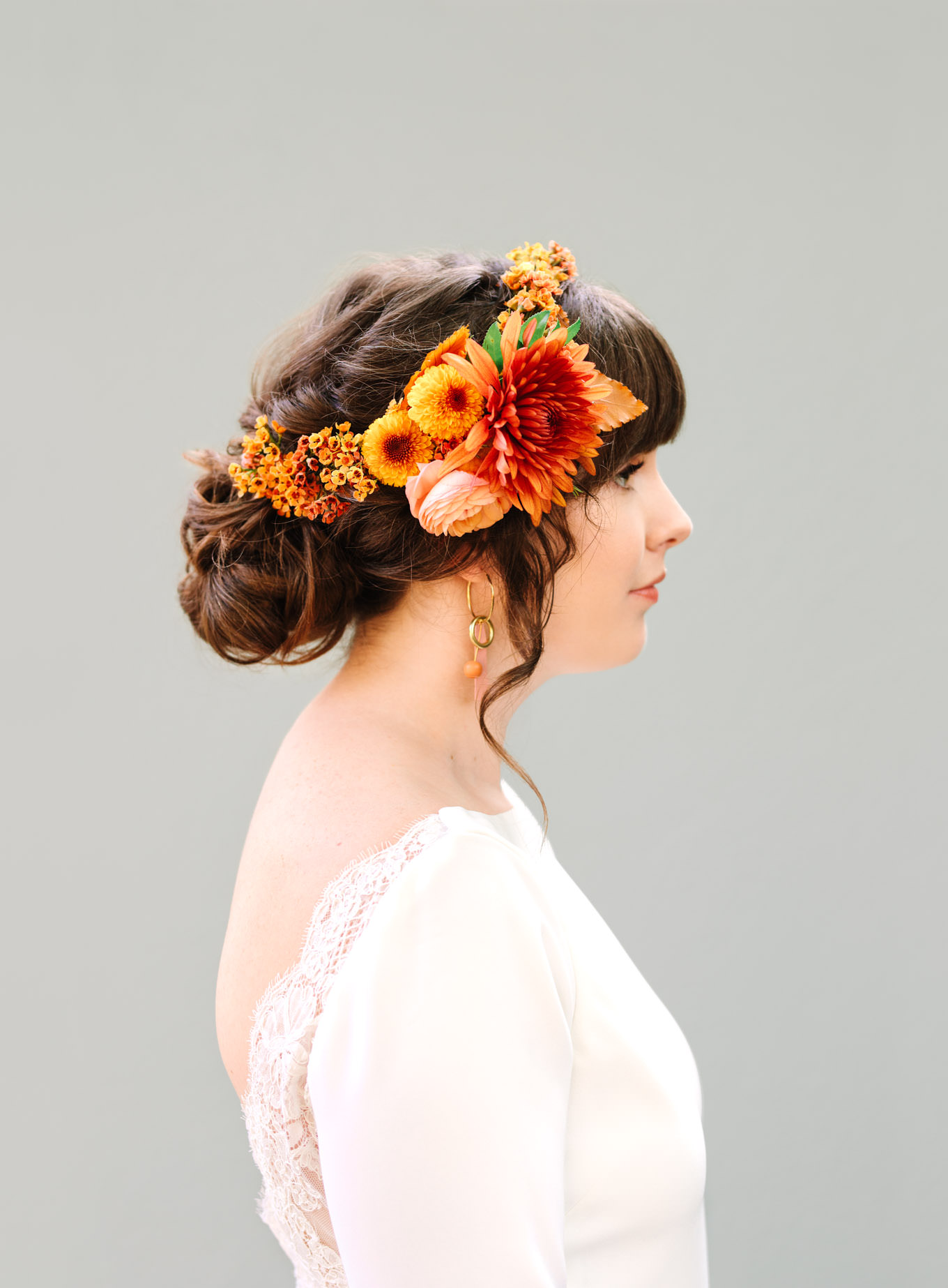 Gorgeous bridal profile with floral crown | Vibrant backyard micro wedding featured on Green Wedding Shoes | Colorful LA wedding photography | #losangeleswedding #backyardwedding #microwedding #laweddingphotographer Source: Mary Costa Photography | Los Angeles