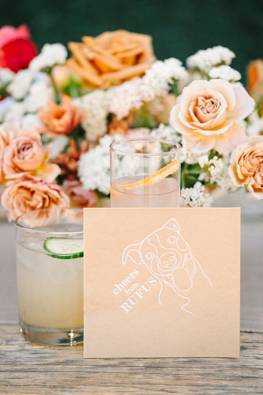 Custom napkins with bride and groom's dog | Pink and orange Lautner Compound wedding | Colorful Palm Springs wedding photography | #palmspringsphotographer #palmspringswedding #lautnercompound #southerncaliforniawedding  Source: Mary Costa Photography | Los Angeles
