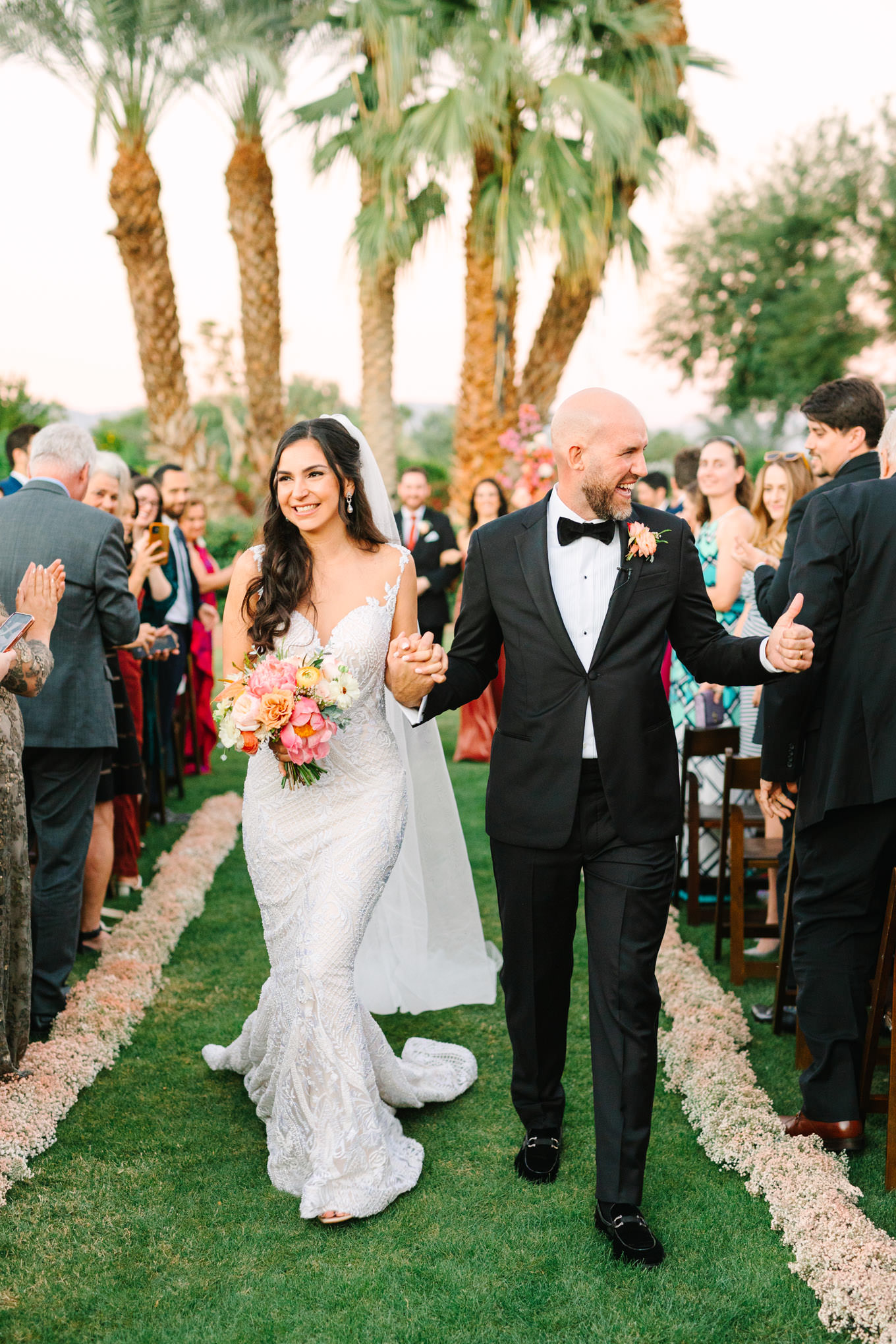 Walk down aisle| Pink Bougainvillea Estate wedding | Colorful LA wedding photography | #bougainvilleaestate #palmspringswedding #palmspringsweddingvenue #palmspringsphotographer Source: Mary Costa Photography | Los Angeles