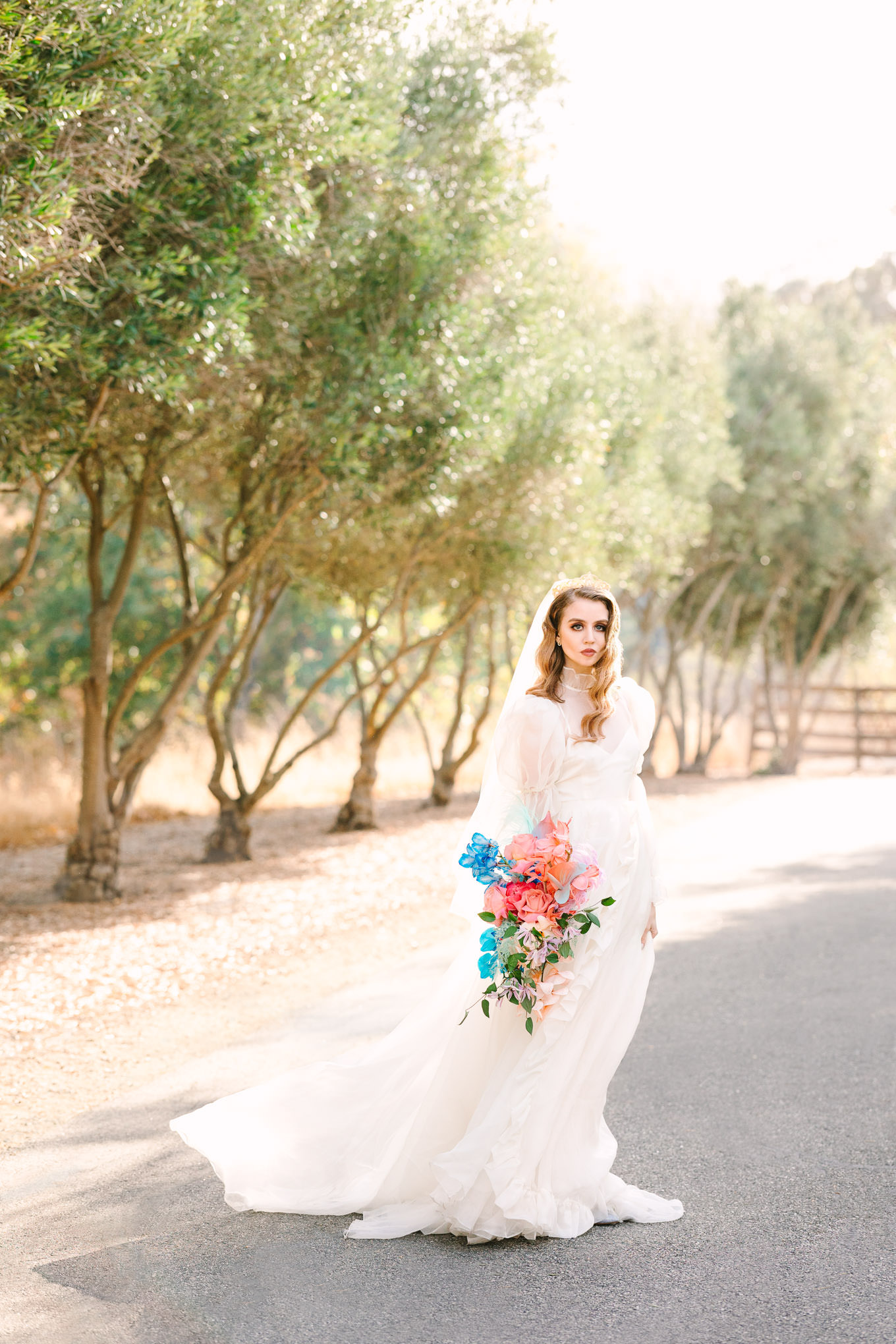 Bride Allison Harvard wearing Odylyne The Ceremony Caspian gown | Colorful and quirky wedding at Higuera Ranch in San Luis Obispo | #sanluisobispowedding #californiawedding #higueraranch #madonnainn   Source: Mary Costa Photography | Los Angeles