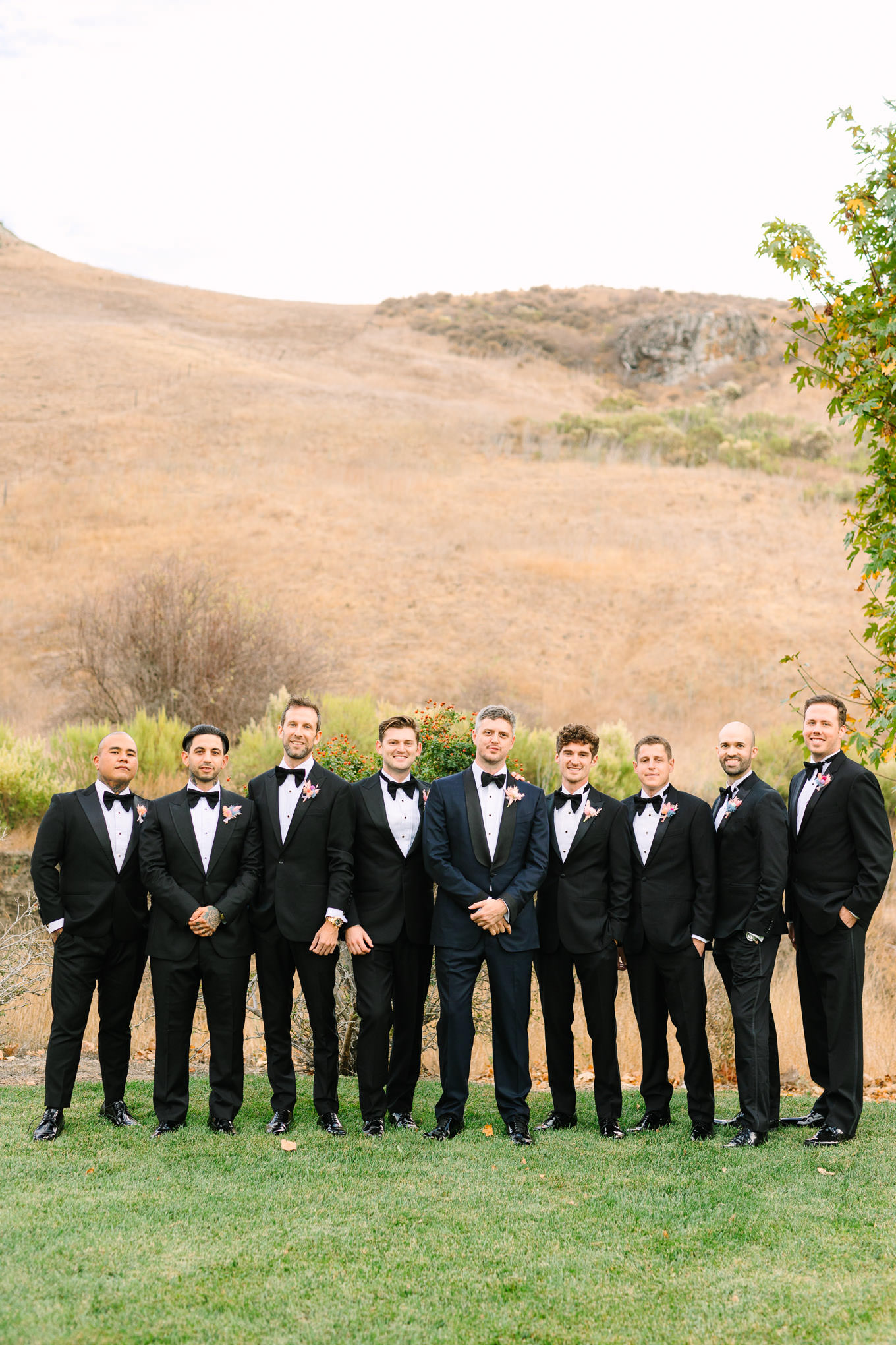 Dapper groomsmen in black tuxedos | Colorful and quirky wedding at Higuera Ranch in San Luis Obispo | #sanluisobispowedding #californiawedding #higueraranch #madonnainn   
Source: Mary Costa Photography | Los Angeles