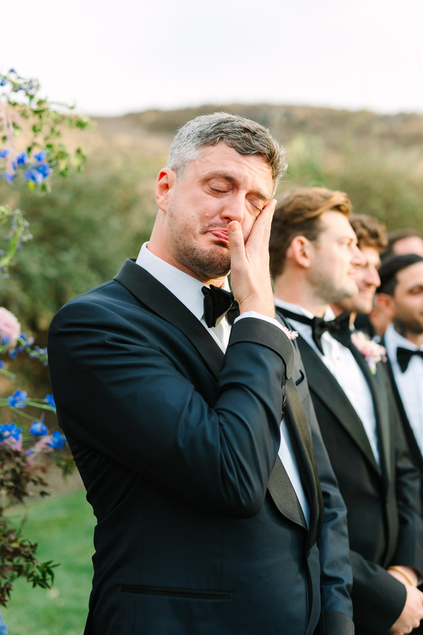 Groom crying at wedding ceremony | Colorful and quirky wedding at Higuera Ranch in San Luis Obispo | #sanluisobispowedding #californiawedding #higueraranch #madonnainn   
Source: Mary Costa Photography | Los Angeles
