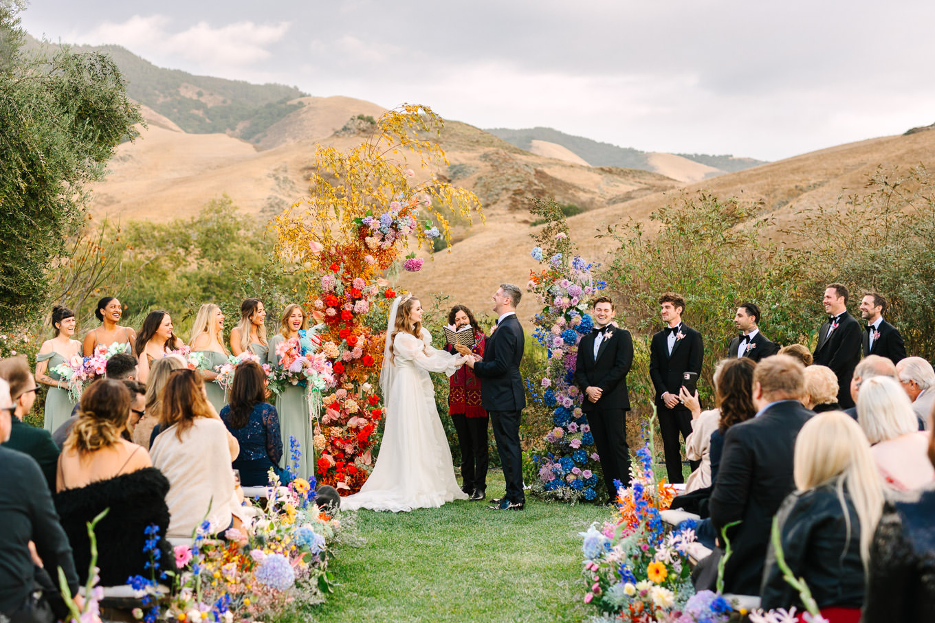Allison Harvard & Jeremy Burke's floral-filled wedding ceremony | Colorful and quirky wedding at Higuera Ranch in San Luis Obispo | #sanluisobispowedding #californiawedding #higueraranch #madonnainn   Source: Mary Costa Photography | Los Angeles