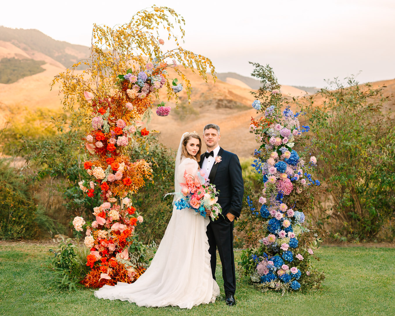 Allison Harvard & Jeremy Burke portraits at floral wedding ceremony installation | Colorful and quirky wedding at Higuera Ranch in San Luis Obispo | #sanluisobispowedding #californiawedding #higueraranch #madonnainn   

Source: Mary Costa Photography | Los Angeles