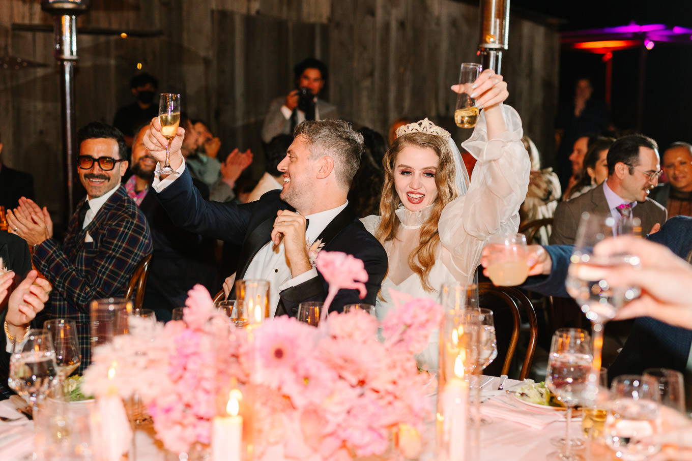 Bride and groom toasting at wedding Monochromatic pastel wedding tables | Colorful and quirky wedding at Higuera Ranch in San Luis Obispo | #sanluisobispowedding #californiawedding #higueraranch #madonnainn   
Source: Mary Costa Photography | Los Angeles