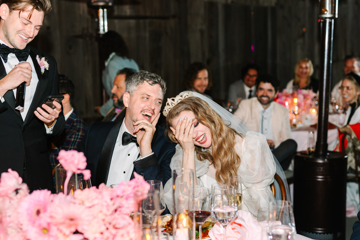 Bride and groom laughing at wedding Monochromatic pastel wedding tables | Colorful and quirky wedding at Higuera Ranch in San Luis Obispo | #sanluisobispowedding #californiawedding #higueraranch #madonnainn   Source: Mary Costa Photography | Los Angeles