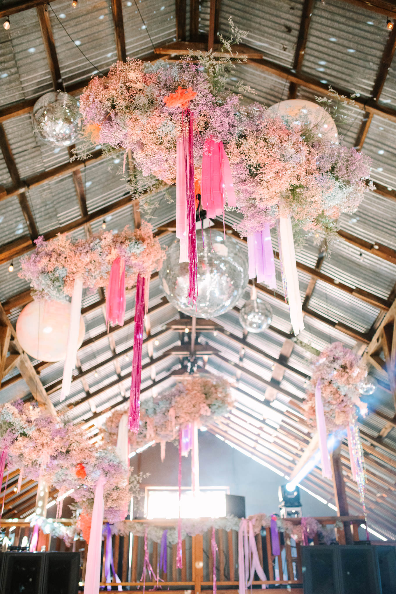 Whimsical disco ball and baby's breath wedding reception installation | Colorful and quirky wedding at Higuera Ranch in San Luis Obispo | #sanluisobispowedding #californiawedding #higueraranch #madonnainn   
Source: Mary Costa Photography | Los Angeles
