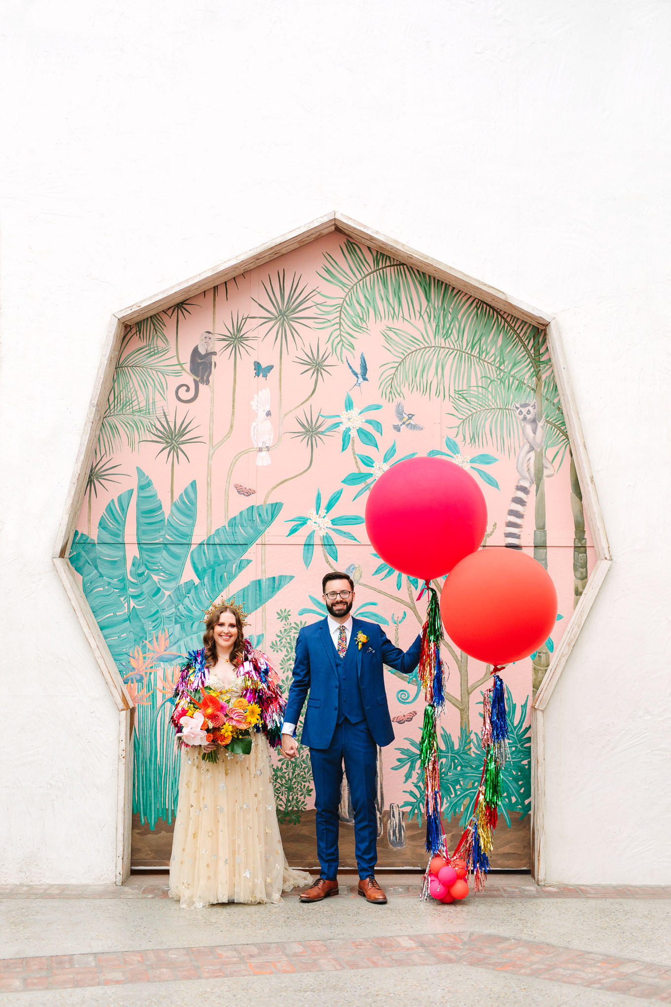 Bride and groom with colorful giant balloons First look between bride and groom | Colorful Downtown Los Angeles Valentine Wedding | Los Angeles wedding photographer | #losangeleswedding #colorfulwedding #DTLA #valentinedtla   Source: Mary Costa Photography | Los Angeles