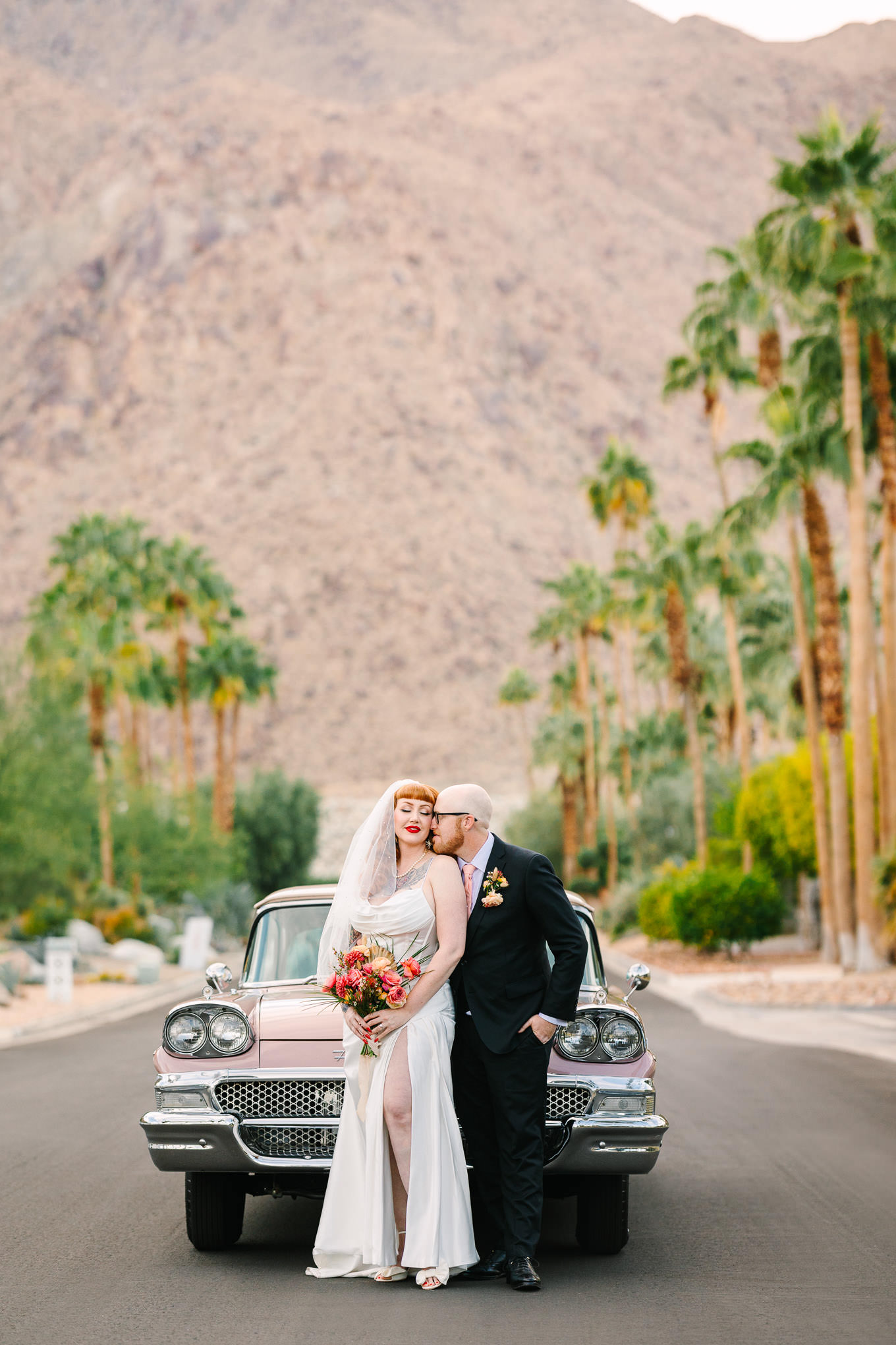 Palm Springs micro wedding with pink car | Wedding and elopement photography roundup | Los Angeles and Palm Springs  photographer | #losangeleswedding #palmspringswedding #elopementphotographer

Source: Mary Costa Photography | Los Angeles
